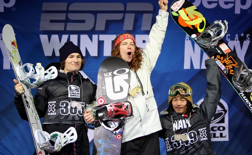 White takes the podium after winning the gold medal in the men's snowboard superpipe at Winter X Games 14 at Buttermilk Mountain in Aspen, Colo. in 2010.