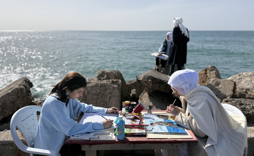 Palestinian female artists gather at the beach in Gaza City for the first time since the war began to paint as a form of therapy, on Feb. 12, 2026.