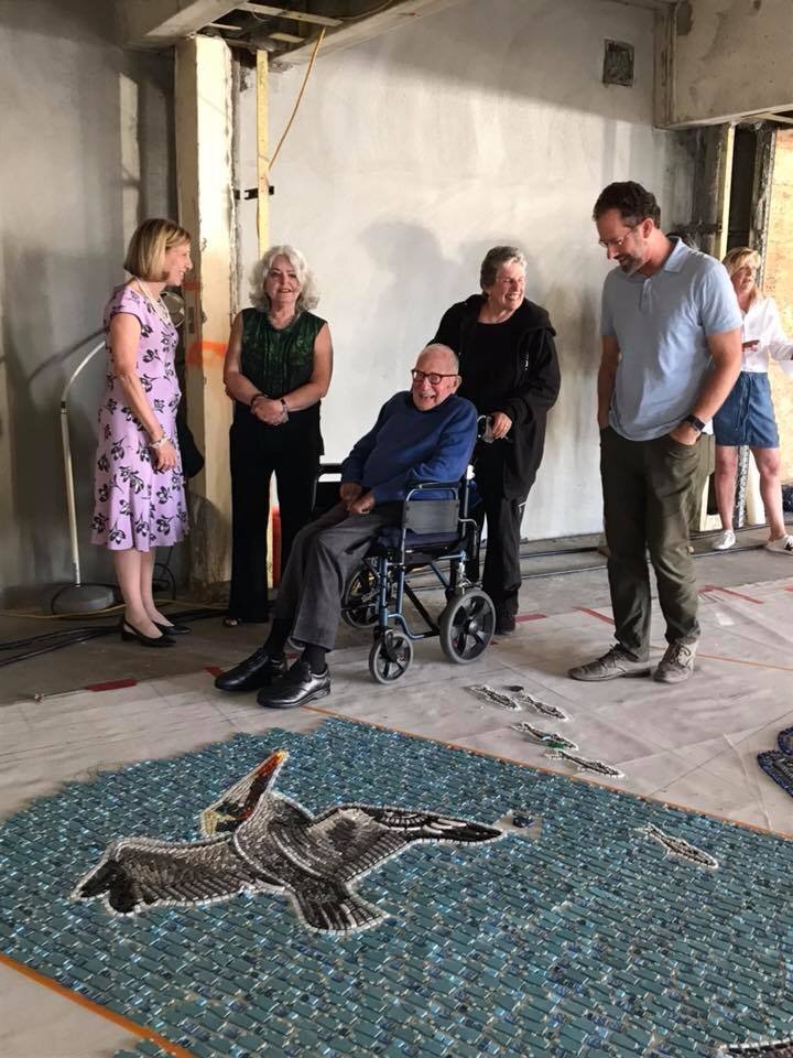Walter and Mary Munk visit the artist's studio to check in on the progress of The Map in this undated photo.