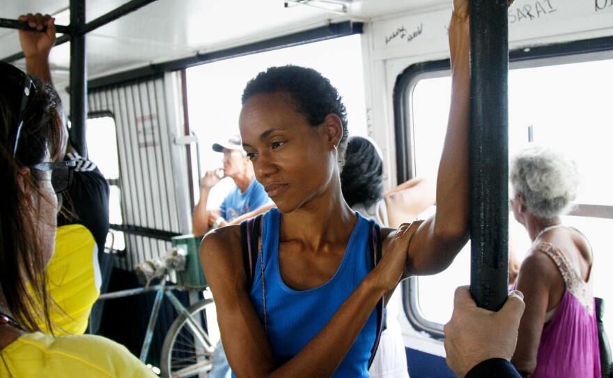 Yusimí Rodríguez López, an author and journalist, aboard a ferry on the way to Regla, a poor and largely black neighborhood.