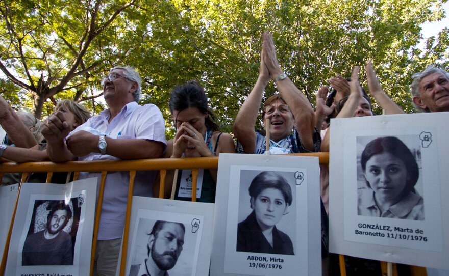 Relatives and friends of victims hear news of the sentences handed down to Jorge Rafael Videla and other past junta leaders in Cordoba, Argentina, on Dec. 22, 2010. Videla was sentenced to life in prison for crimes against humanity.