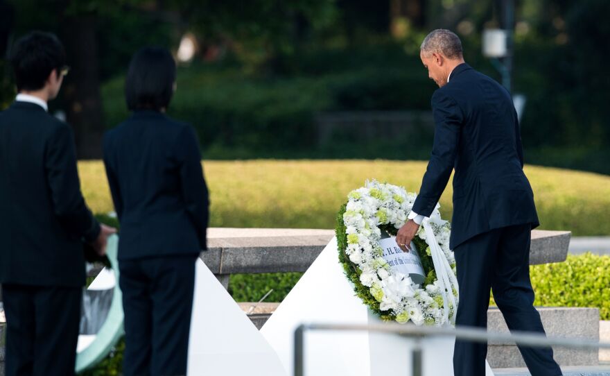 Obama lays a wreath at the Hiroshima Peace Memorial Park Cenotaph on Friday. Obama is the first sitting U.S. leader to visit the site that ushered in the age of nuclear conflict.