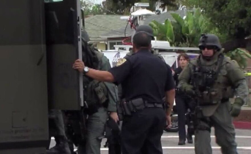 Officers and a SWAT team are pictured during a standoff in Chula Vista, May 28, 2015.