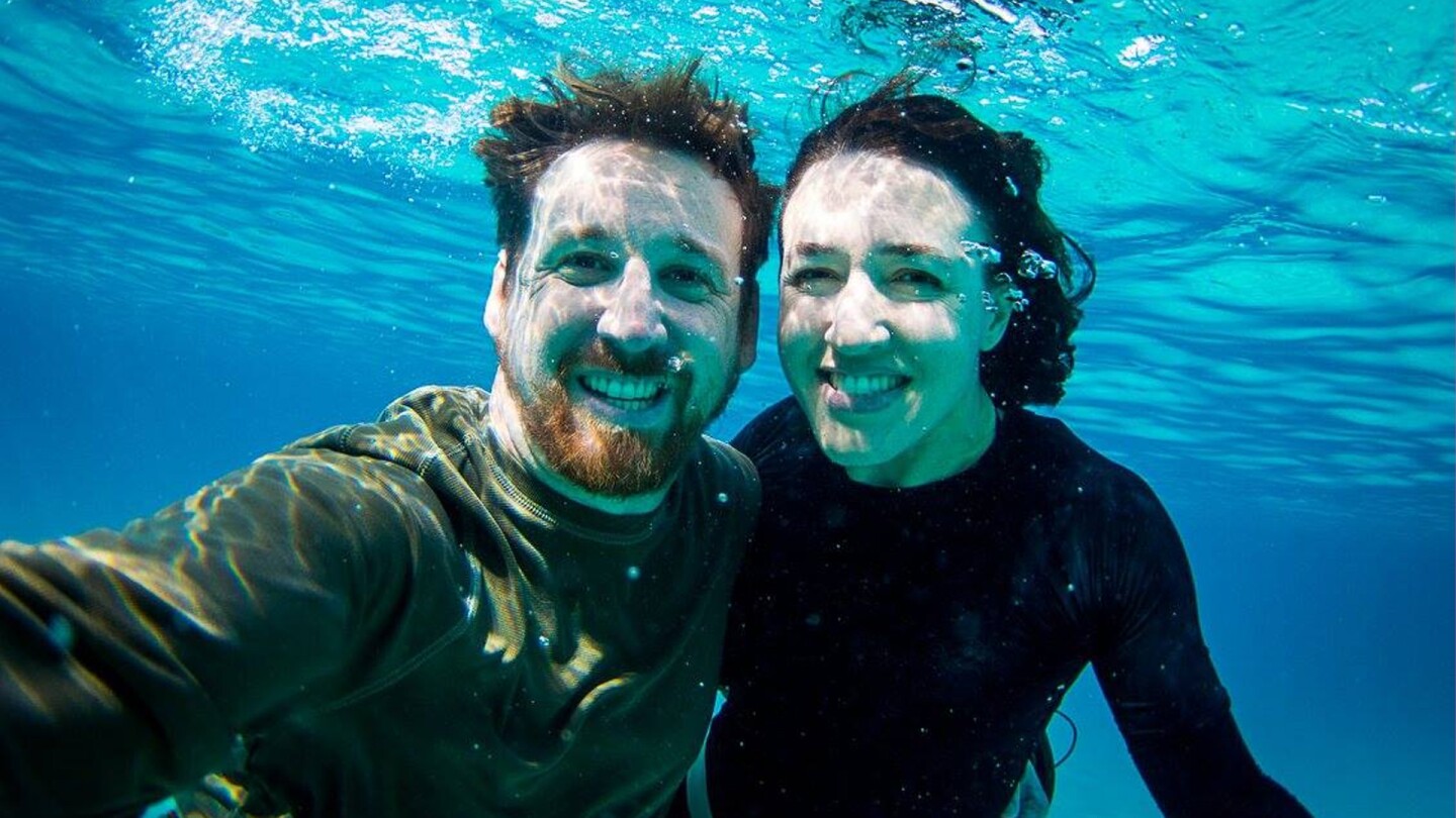 A sailboat, fate and a forever love by Robin Lang My husband, Paul, and I first met on a sailboat at the Police Dock on Shelter Island. I was 18, and it was his 19th birthday (Sept. 24, 2000). My girlfriends and I had been invited by his mutual friends, who lived in the engineering dorm together at SDSU), to go sailing for the day. Serendipitously, my best friend and I had met his friends in Avalon on Catalina Island walking just a few weeks prior. That day, as we went sailing, Paul's tiller broke. He nonchalantly got out his toolbox, fixed it without breaking a sweat and didn't even mention it. I was smitten. I should mention that he had recently moved onto the sailboat, living on it because it was cheaper than paying rent on land. He and I were both in college and shy introverts, while our friends were outgoing. I wanted to see him again, but I was too terrified to give him my number in front of everyone. I went down below into the cabin, wrote my number down and tried to find a spot to hide it, so he'd find it later while in private (should I hide it under his pillow, in the book he was reading?). I decided that would be creepy. When he came down, we chatted about a picture of him on the wall climbing Mount Shasta (he's from NorCal). I remember our eyes locked, and it took my breath away. I realized at that moment I had to get to know this guy, no other option. But I was still too scared to give him my number, and he was too shy to ask. After the sail, he tied the boat back on the Police Dock, and my friends and I walked back to the parking lot. As we were about to leave, fate kept nagging at me. At the last minute, I ran back down the gangplank to give him my number (embarrassment be damned) only to see his sailboat gliding through the water as he pulling away from the dock. Dejected, I got into my friend's car. As we were driving down Shelter Island, we drove next to the car full of new friends we had met on Catalina. We all had our windows down. I figured it was now or never. I handed my number to my friend to pass through the open window to the driver of the other car (as we're all driving down the road) and yelled to make sure it got to Paul. Four or five days went by, and I didn't hear anything. I figured maybe he wasn't interested after all. But the call finally came. This was just as cell phones were becoming popular, and I didn't have one yet, so he had to call me on the landline at my parents' house. Thankfully, I was home, and we talked for over two hours during that first call. Twenty-five years later, we've been married for 17 years, have triplet seven-year-old boys, both work at universities in town and have gone on countless adventures together (some on a sailboat). Looking back, so many things had to align for us to meet. My friend and I almost missed the last ferry of the day to Catalina on what was a super last-minute trip. I wonder what would have happened if my phone number had blown away in the wind as it was handed through a car window or if his friend lost it or didn't give it to him. Every day, I'm thankful that ended up together and are still going strong.