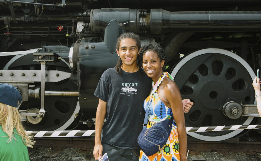 Train enthusiast Brandon Westerfield, 15, stands for a portrait with his mom, Alethea Westerfield, 47, in front of Union Pacific's Big Boy No. 4014.