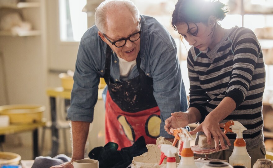 John and Rosie work on a ceramics project at the Community Center of La Cañada Flintridge. "Art Happens Here With John Lithgow" premieres Friday, April 26, 2024.