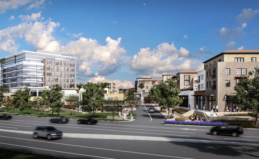 An artist's rendering of an office tower in the proposed One Paseo project in Carmel Valley shows how it would be built on a lower-lying area on the east side of the property.