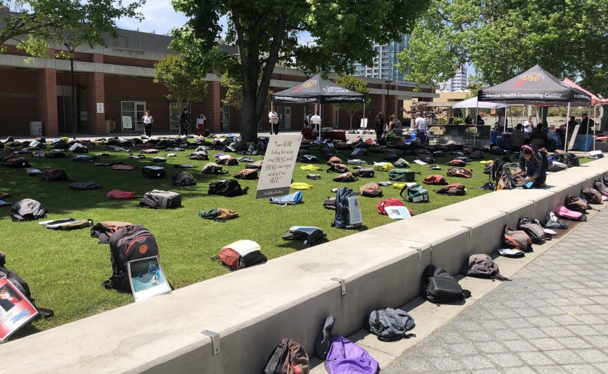 Backpacks spread throughout Curran Plaza at San Diego City College for the "Send Silence Packing" suicide display, May 9, 2018. 