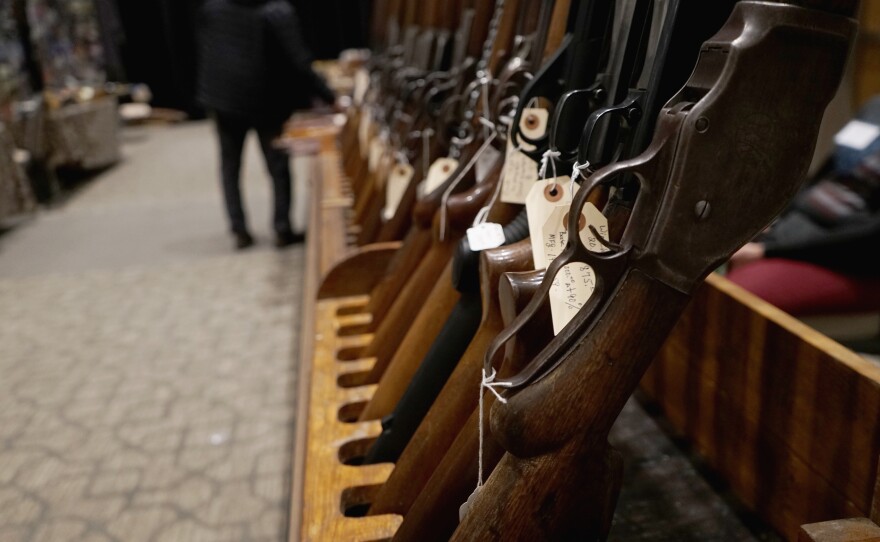 Rows of guns for sale were on display at the Vernal Knife and Gun Show in northeastern Utah, where firearms are imbued in the culture.