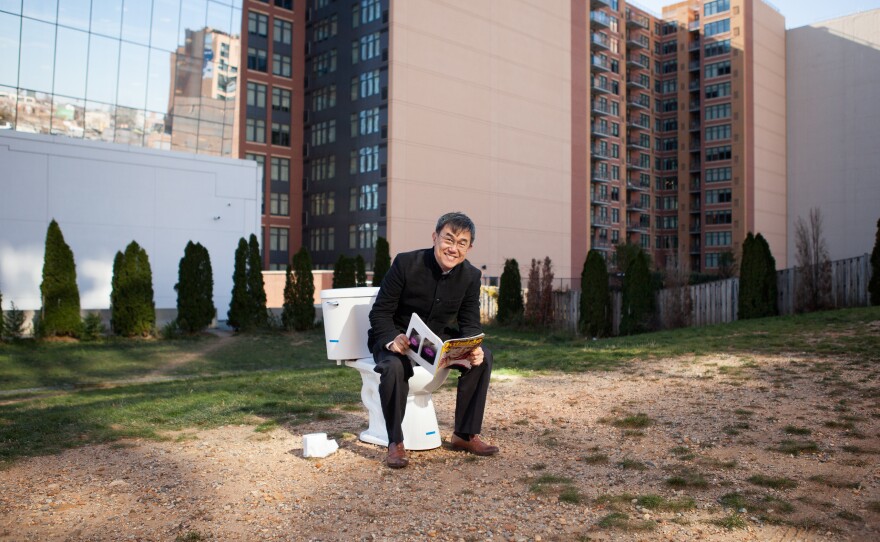 They don't call him Mr. Toilet for nothing! On a cold and windy November day, Jack Sim visited NPR and gladly struck a pose on his favorite appliance. Note: This toilet was not hooked up.