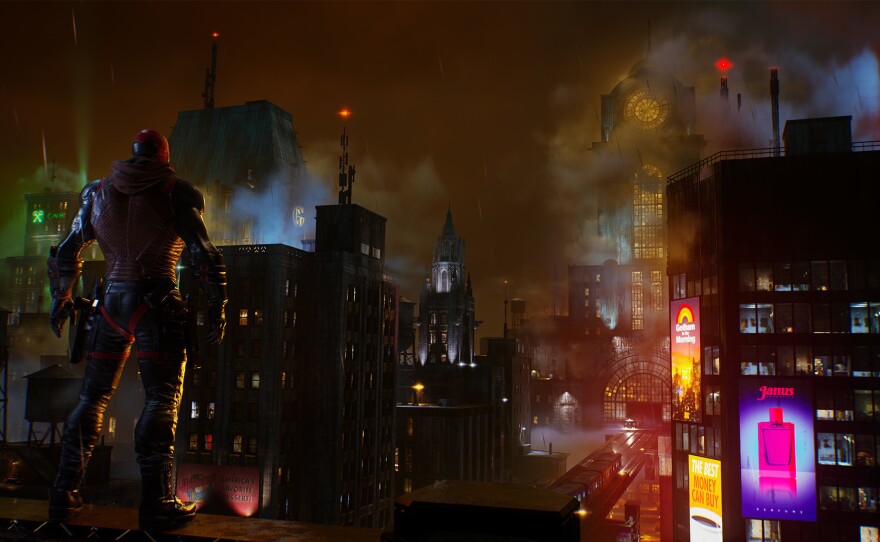 Red Hood surveys Gotham.