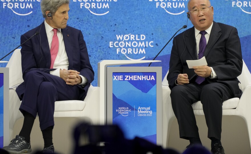 John Kerry, left, listens to Xie Zhenhua, Special Envoy for Climate Change for China, during the World Economic Forum in Davos, Switzerland, in 2022.