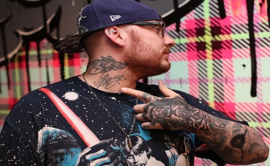Becoming Bang Bang: "I dropped out of high school to tattoo outside of a trailer park, and I tattooed guns on my neck so that I'd have no choice other than to succeed at it."