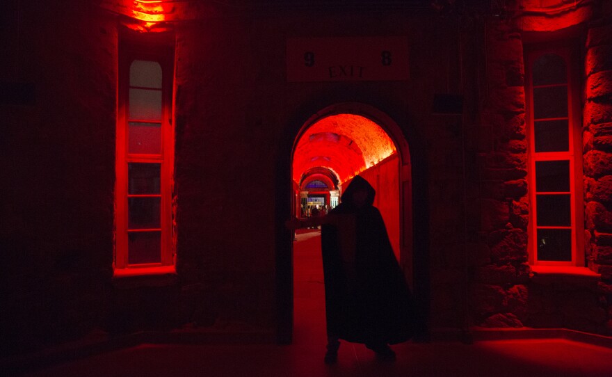 An actor lurks in the Eastern State Penitentiary rotunda during "Terror Behind The Walls," in Philadelphia. At night, the former prison transforms into America's largest haunted attraction outside of a theme park.