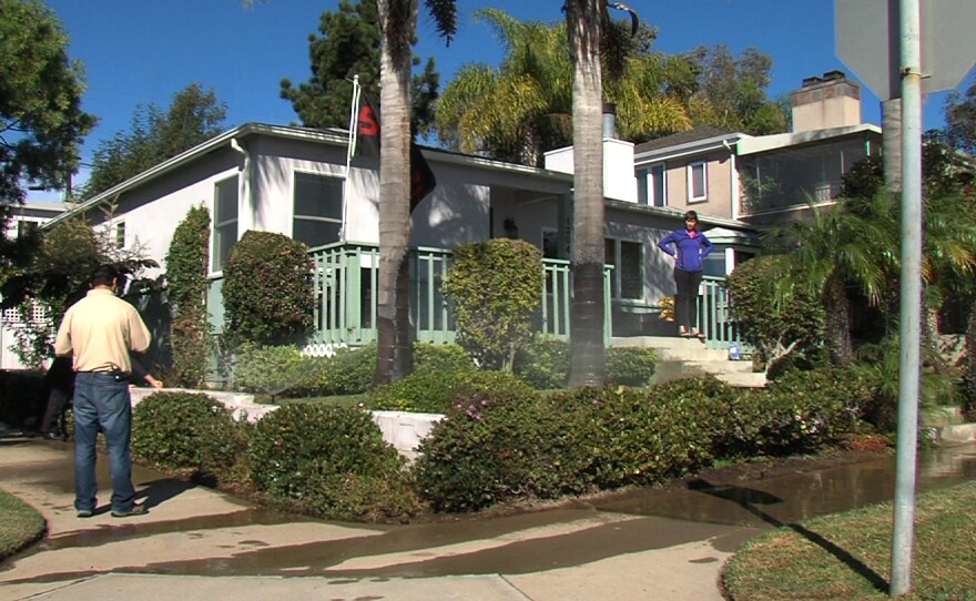 Victor Sandoval, a field representative for the city of San Diego's Public Utilities Department, checks the sprinklers at a Pacific Beach home on Nov. 20, 2014.