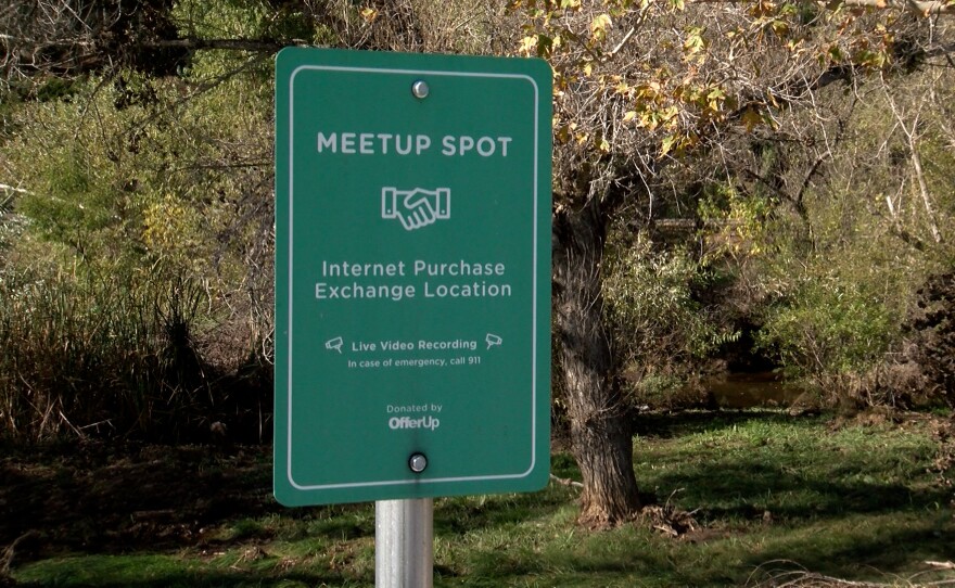 Pictured, a sign that reads "Meetup Spot" designated for internet purchase exchanges outside of the Escondido Police Department. December 16, 2021.