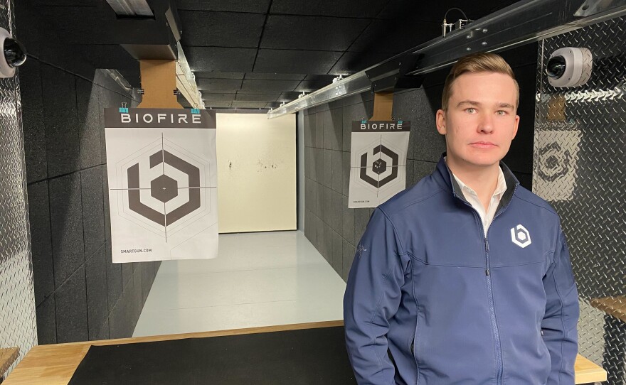 Kai Kloepfer stands in the firing range at Biofire's headquarters outside Denver.