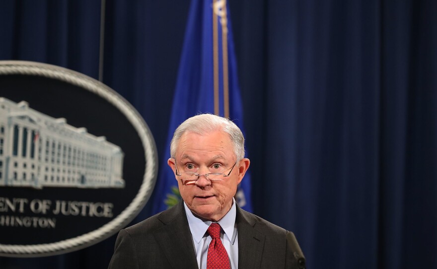 Attorney General Jeff Sessions holds a news conference at the Department of Justice last week, highlighting his department's fight to reduce violent crime.