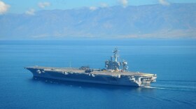 PORT-AU-PRINCE, Haiti (Jan. 18, 2010) The Nimitz-class aircraft carrier USS Carl Vinson (CVN 70) performs maneuvers off the coast of Haiti as part of relief efforts. 