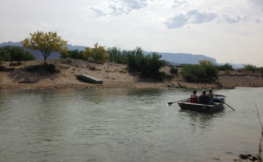 A man rows tourists across the small stretch of the Rio Grande linking Big Bend National Park and Boquillas Del Carmen.