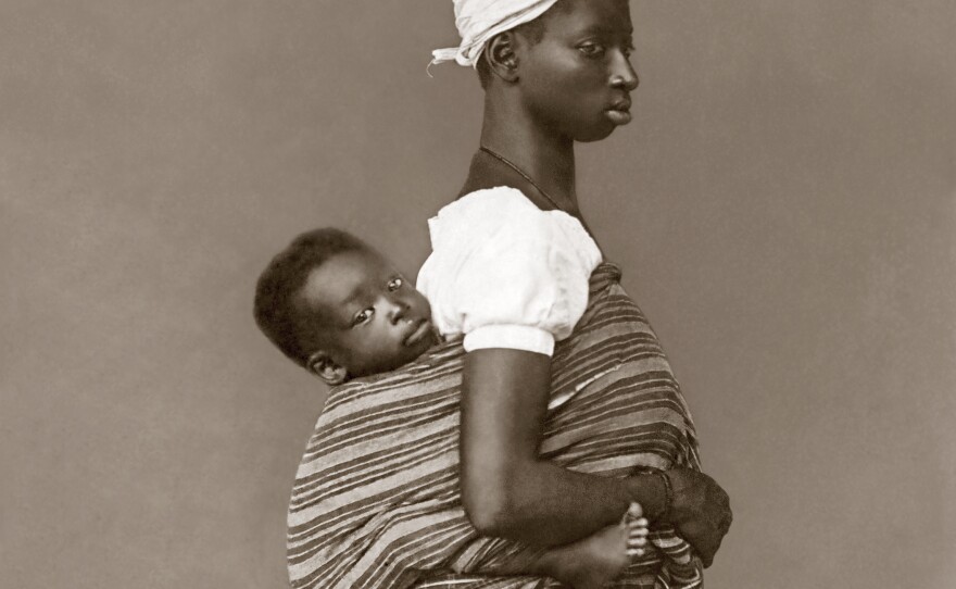 A slave with her child, photographed in 1884, Salvador de Bahia.