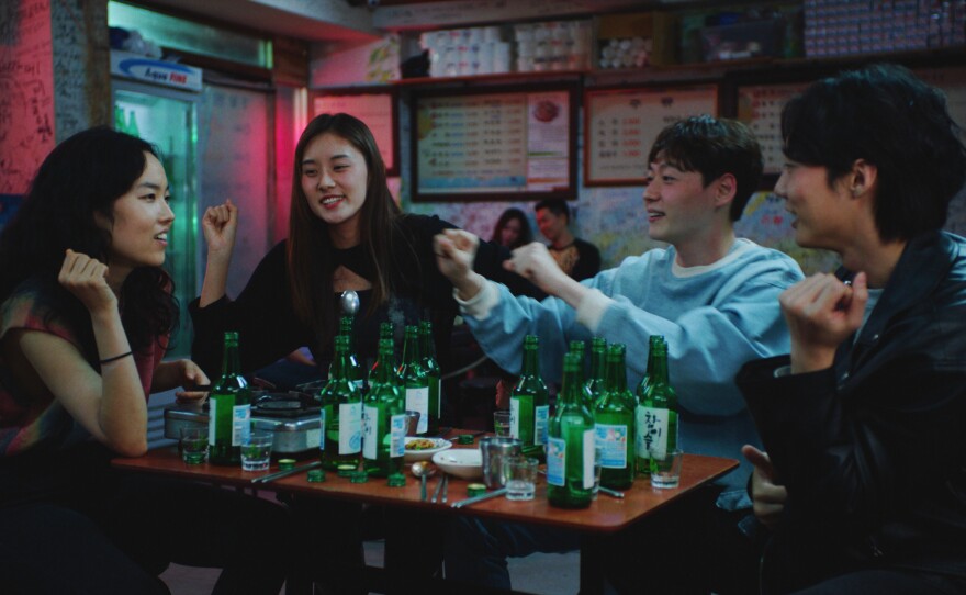 Freddie (Park Ji-Min) entertains new friends in <em>Return to Seoul.</em>