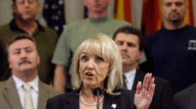 Republican Gov. Jan Brewer of Arizona talks about the sweeping new immigration bill she signed into law Friday, in Phoenix.