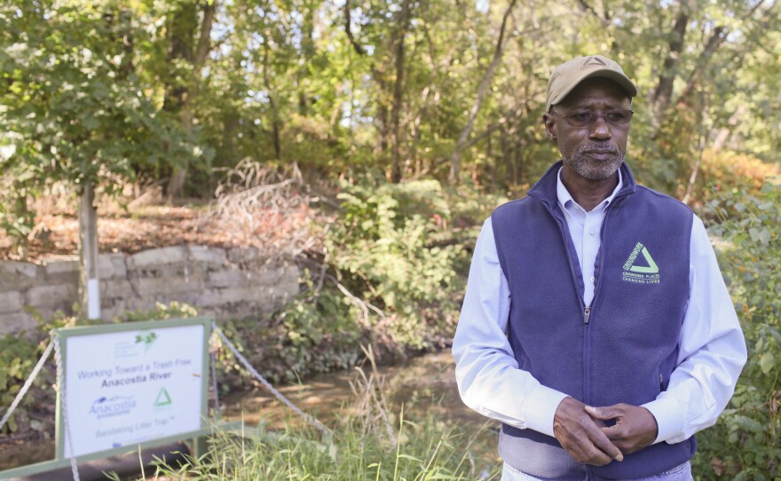 Dennis Chestnut stands next to a stretch of the Anacostia River in Washington, D.C., on Oct. 2. Chestnut, who has been working to clean up the Anacostia for decades, says it can take a long time for a nonprofit to see an end result.