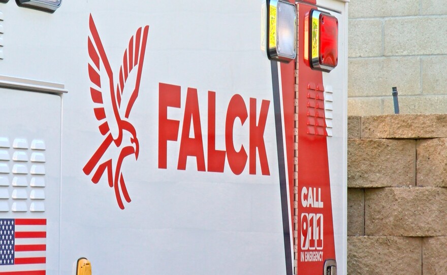 The Falck logo on the side of a parked ambulance Feb. 24, 2022.