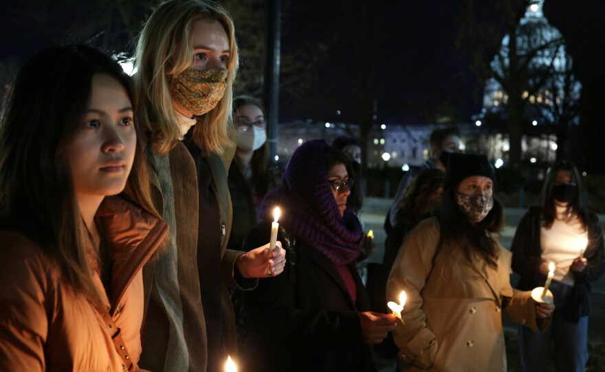 Activists participate in a candlelight vigil for abortion rights near the U.S. Supreme Court on Dec, 13, 2021 in Washington, D.C.