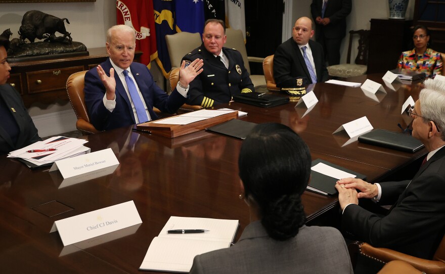 President Biden hosts a White House meeting about reducing gun violence on July 12. Violent crime is on the rise in many U.S. urban areas, and Democratic political strategists believe the White House needs to take on the issue of crime directly.