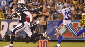 San Diego Chargers wide receiver Dontrelle Inman out runs Dallas Cowboys defensive back Ryan Smith with a 70 yard touchdown reception during the second half of a preseason NFL football game in San Diego Thursday, Aug. 7, 2014.