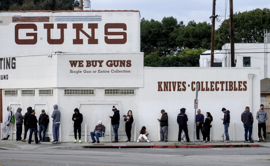 People wait in line to enter a gun store in Culver City, Calif., on March 15, 2020. On Thursday, Sept. 7, 2023, the California Senate voted to raise taxes on the sale of guns and ammunition in the state. If it becomes law, the money would pay for violence prevention programs and school security improvements.