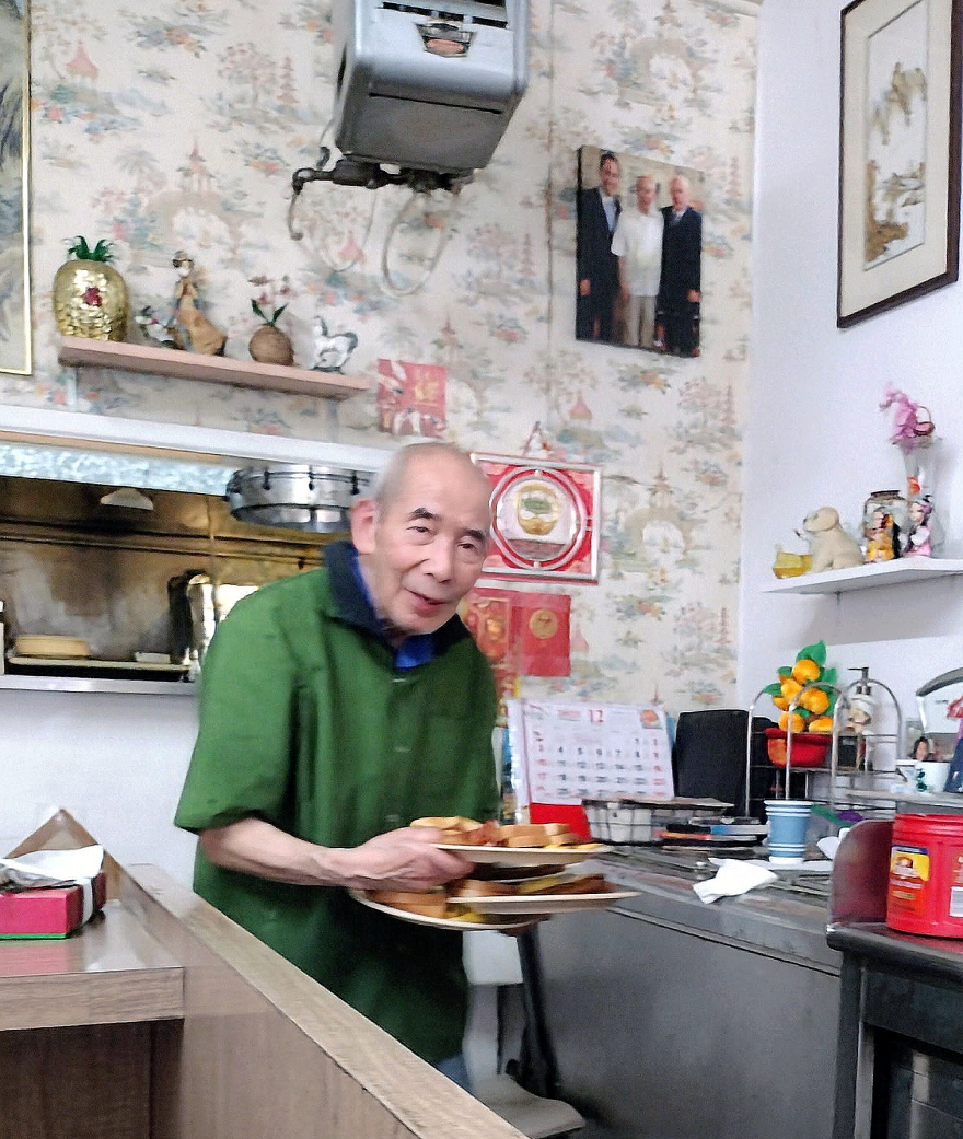 With breakfast plates in hand, Lucky Wong welcomed customers inside his North Park diner, Lucky's Golden Phenix.