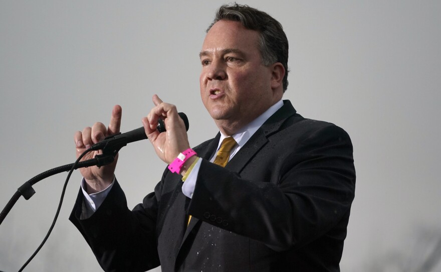 Rep. Alex Mooney, a Republican candidate for West Virginia's 2nd Congressional District, addresses a rally put on by former President Donald Trump in Greensburg, Pa., on Friday.