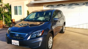 David Kern's electric Toyota RAV4 parked in the driveway of his Poway home on June 19, 2014.
