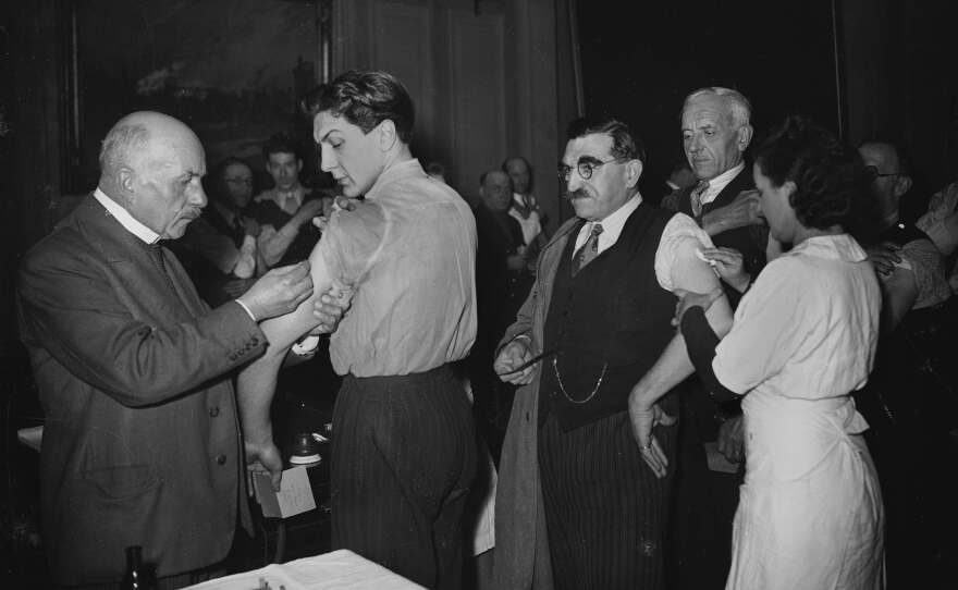 Smallpox vaccines being administered in Paris in 1941. When the disease was eradicated and vaccination came to a stop, that created an opening for its virus relative monkeypox.