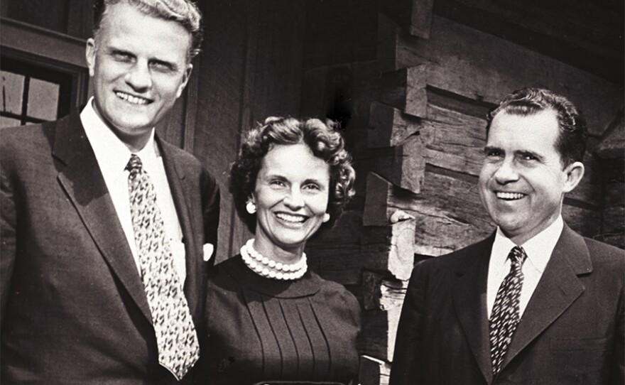 Billy Graham, Ruth Graham, and Richard Nixon outside the Grahams' home. 1960.