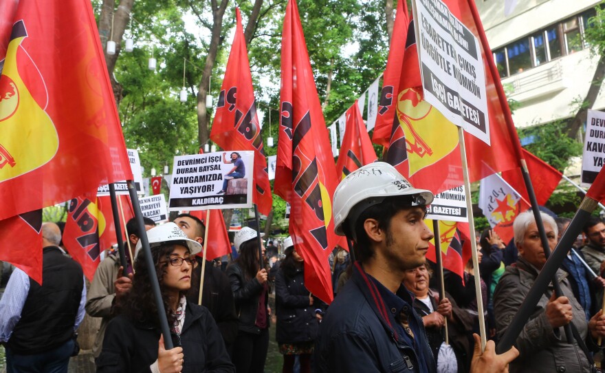 People take part in a march in memory of miners who died in an explosion at the Soma coal mine, on May 13 in Ankara, marking the second anniversary of a disaster that left 301 miners dead. U.S.-based cleric Fethullah Gulen is now being blamed for the tragedy.