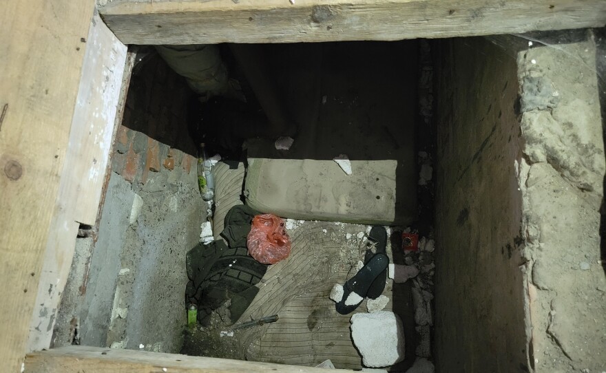 Viktoria Andrusha is believed to have been held in an abandoned building in her village. She would have been on the first level. Two other male prisoners shared this crawl space below.
