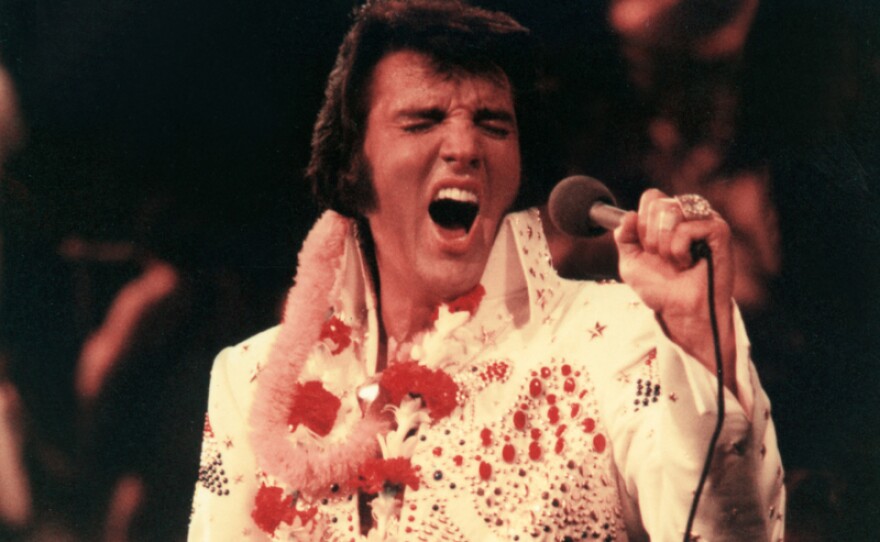Elvis Presley, pictured performing live, made television history in 1973 with a live concert special, televised globally via satellite. Now, 40 years later, don’t miss one of the most outstanding concert performances of his career.