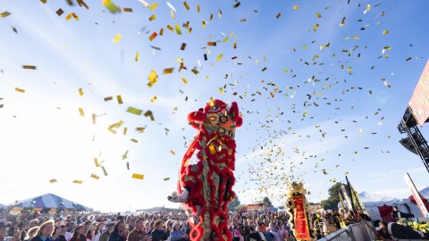 Confetti falls as lion dancers perform at the San Diego Tết Festival on Jan. 31, 2025.