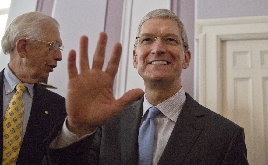 Apple CEO Tim Cook waves to a crowd before he is honored by the Alabama Academy of Honor at the Alabama state Capitol on  Monday.