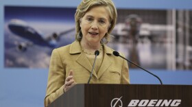 U.S. Secretary of State Hilary Rodham Clinton speaks to workers while visiting a Boeing maintenance facility at Shanghai's Pudong Airport, May 23, 2010.