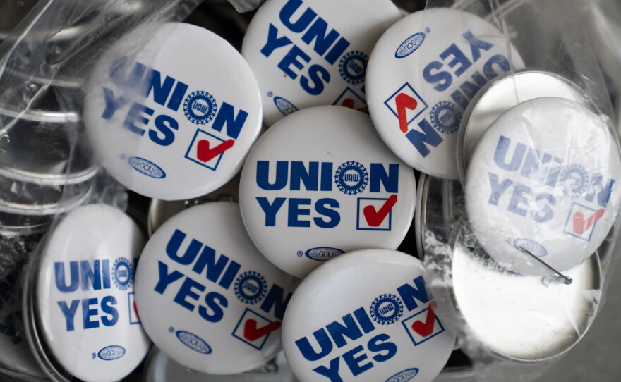 UAW pins that say "Union Yes" are available at the union hall.