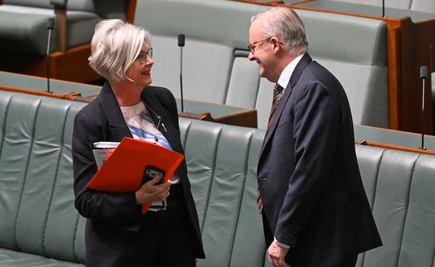 Australian Prime Minister Anthony Albanese speaks to Independent member of parliament, Helen Haines, in the House of Representatives at Parliament House in Canberra, Australia, Tuesday, Aug. 18, 2026.