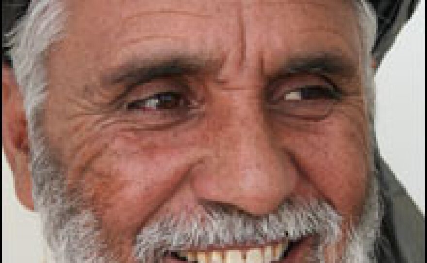 Neyaz Mohammad Sarhadi is district chief of the Panjwai District. He works out of an office at one end of the Panjwai Bazaar, which is one block away from where a suicide bomber killed himself and 21 villagers. Many were wounded.