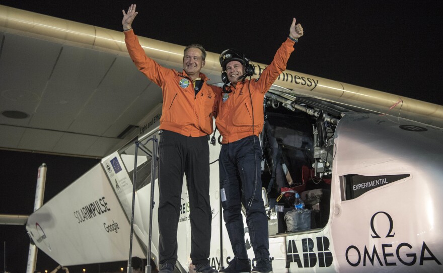 After Solar Impulse's successful landing in Abu Dhabi, the capital of the United Arab Emirates, with Bertrand Piccard at the controls, he posed with fellow pilot Andre Borschberg. The two alternated on 23 days' worth of flights without using any fuel.
