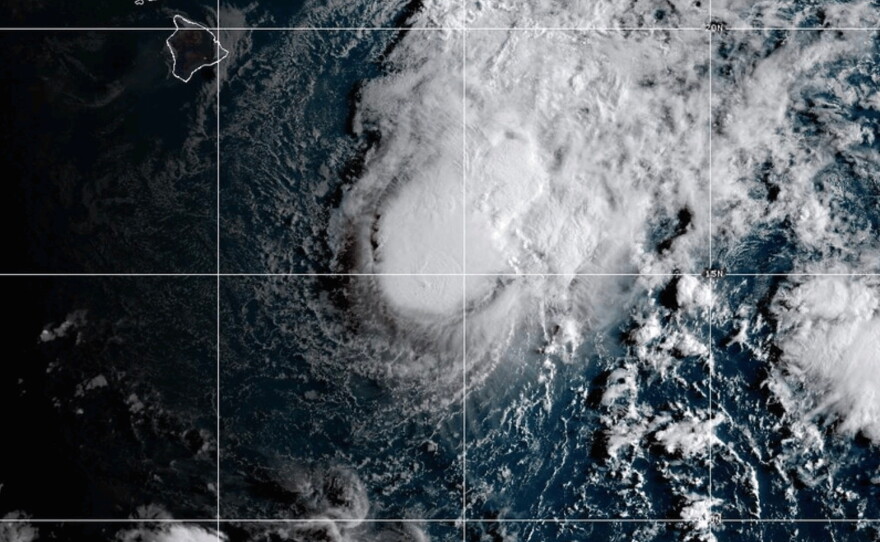 This NOAA satellite image taken Saturday, Aug. 22, 2026, shows Tropical Storm Moke advancing towards Hawaii in the Pacific Ocean.