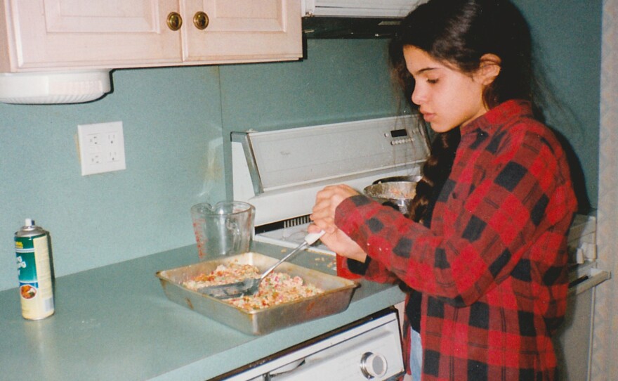 Liz Alpern baking Rice Krispies treats as a child. Alpern was one of the storytellers at Schmaltzy. She says growing up, her Long Island family was not known for cooking. "We made cookies that you sliced and put in the oven. That was baking."